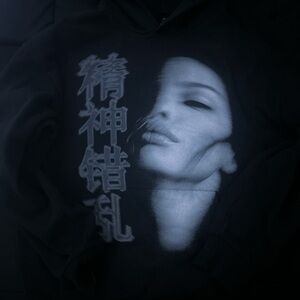 Black Hoodie with Artistic Face Design